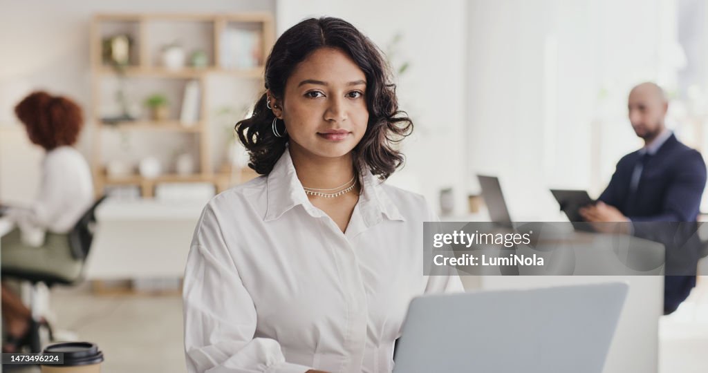 Laptop, office portrait and business woman typing financial savings report, finance budget proposal or company project funding. Accountability, coworking space or person review compliance feedback