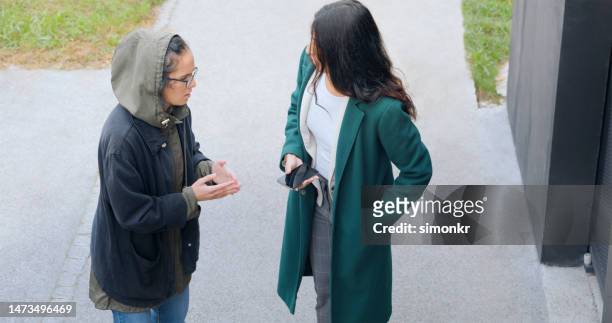 woman asking for help - hands in pockets stock pictures, royalty-free photos & images