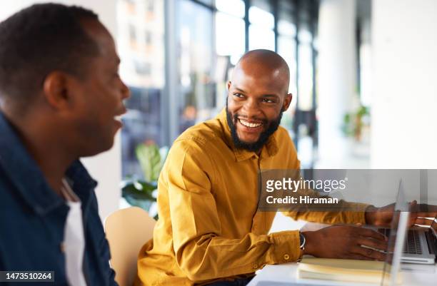 black man, business and smile for teamwork, conversation and planning together in startup company. happy worker talking to colleague at office desk for project, collaboration and strategy discussion - creative agency stock pictures, royalty-free photos & images