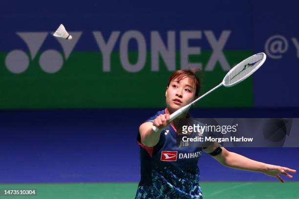 Nozomi Okuhara of Japan in action against Pornpawee Chochuwong of Thailand in the Women's singles match during day one of the Yonex All England Open...