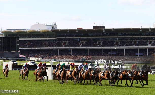 Runners make their way around the course during the Ultima Handicap Chase during day one of the Cheltenham Festival 2023 at Cheltenham Racecourse on...