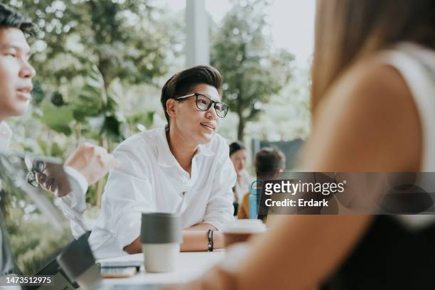 outdoor meeting of marketing team. - environmental conservation business stock pictures, royalty-free photos & images