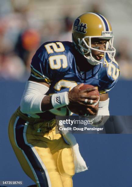 Dietrich Jells, Wide Receiver for the University of Pittsburgh Panthers in motion carrying the football during the NCAA Big East Conference college...