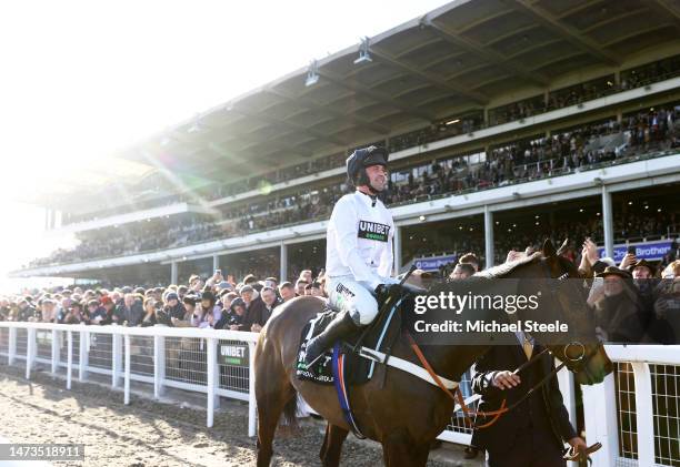 Nico de Boinville celebrates on board Constitution Hill after winning the the Unibet Champion Hurdle Challenge Trophy during day one of the...