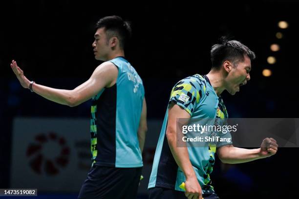 Lee Yang and Wang Chi-Lin of Chinese Taipei react in the Men's Doubles first round match against Ong Yew Sin and Teo Ee Yi of Malaysia on day one of...