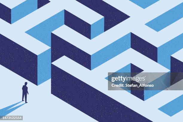 man standing in front of labyrinth entrance - maze stock illustrations