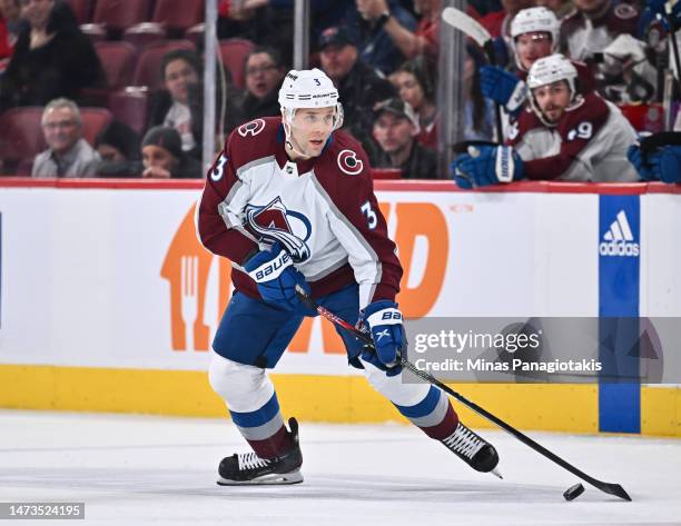 Jack Johnson of the Colorado Avalanche skates the puck during the first period against the Montreal Canadiens at Centre Bell on March 13, 2023 in...