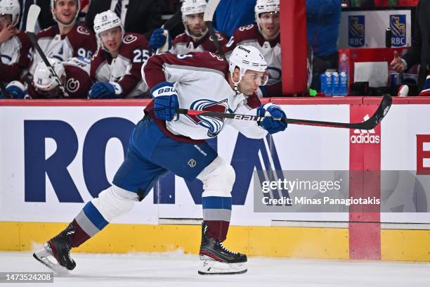 Jack Johnson of the Colorado Avalanche takes a shot during the first period against the Montreal Canadiens at Centre Bell on March 13, 2023 in...