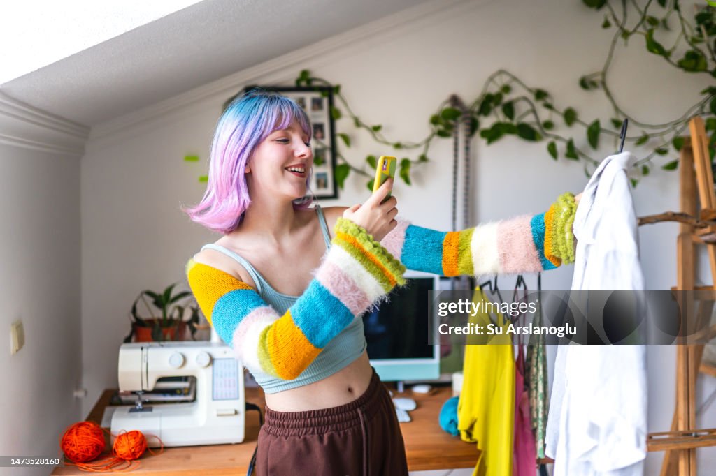 Portrait of young girl selling her clothes online