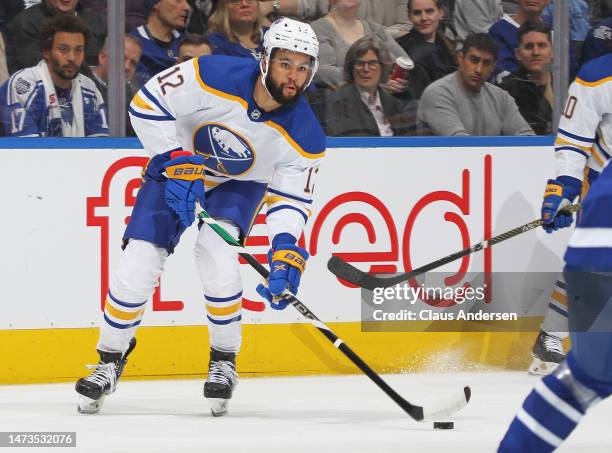 Jordan Greenway of the Buffalo Sabres gets set to make a pass against the Toronto Maple Leafs during an NHL game at Scotiabank Arena on March 13,...