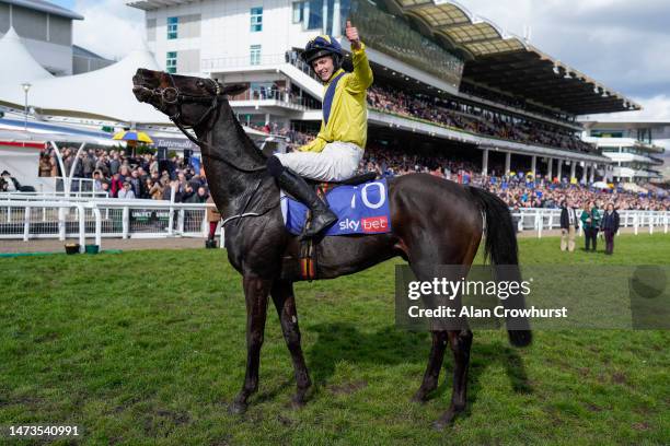 Michael O'Sullivan riding Marine Nationale celebrate winning The Sky Bet Supreme Novices' Hurdle during day one of the Cheltenham Festival 2023 at...