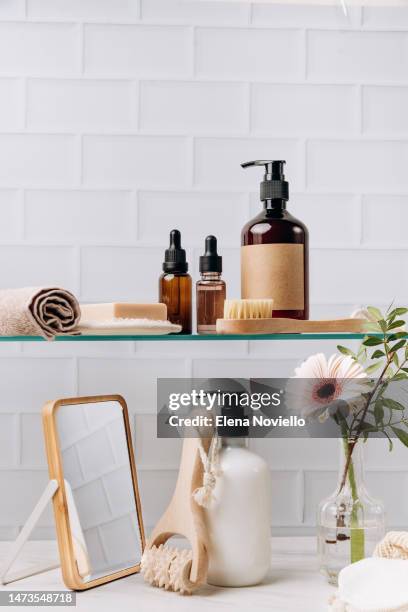 body and face care beauty bath set. bottles shampoo or shower gel  lotion, essential oil, cream, massage brushes and anti-cellulite - jojoba stockfoto's en -beelden