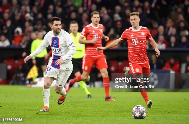 Lionel Messi of PSG, Joshua Kimmich of Bayern Munich during the UEFA Champions League round of 16 leg two match between FC Bayern Munich and Paris...