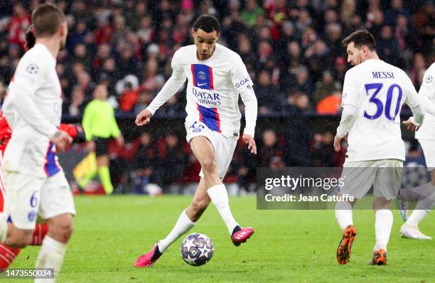 Hugo Ekitike, Lionel Messi of PSG during the UEFA Champions League round of 16 leg two match between FC Bayern Munich and Paris Saint-Germain at...