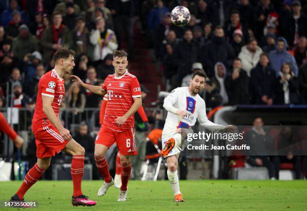 Lionel Messi of PSG, Joshua Kimmich of Bayern Munich during the UEFA Champions League round of 16 leg two match between FC Bayern Munich and Paris...