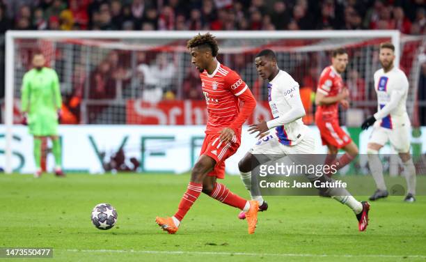 Kingsley Coman of Bayern Munich, Nuno Mendes of PSG during the UEFA Champions League round of 16 leg two match between FC Bayern Munich and Paris...