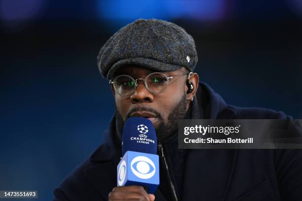 Presenter, Micah Richards looks on prior to the UEFA Champions League round of 16 leg two match between Manchester City and RB Leipzig at Etihad...