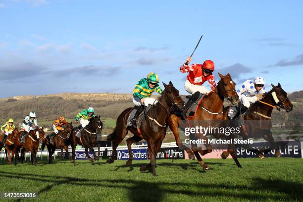 Michael O'Sullivan on board Jazzy Matty on his way to winning the Boodles Juvenile Handicap Hurdle during day one of the Cheltenham Festival 2023 at...