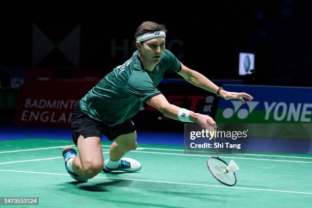 Viktor Axelsen of Denmark competes in the Men's Single first round match against Lee Cheuk Yiu of Hong Kong on day one of the Yonex All England...