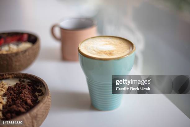 flat white coffee. - latte art stock pictures, royalty-free photos & images