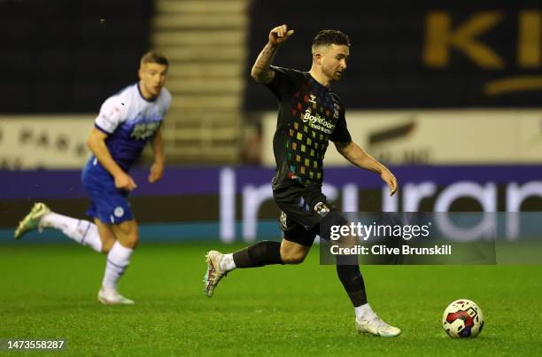 Sean Maguire of Coventry City runs with the ball during the Sky Bet Championship between Wigan Athletic and Coventry City at DW Stadium on March 14,...