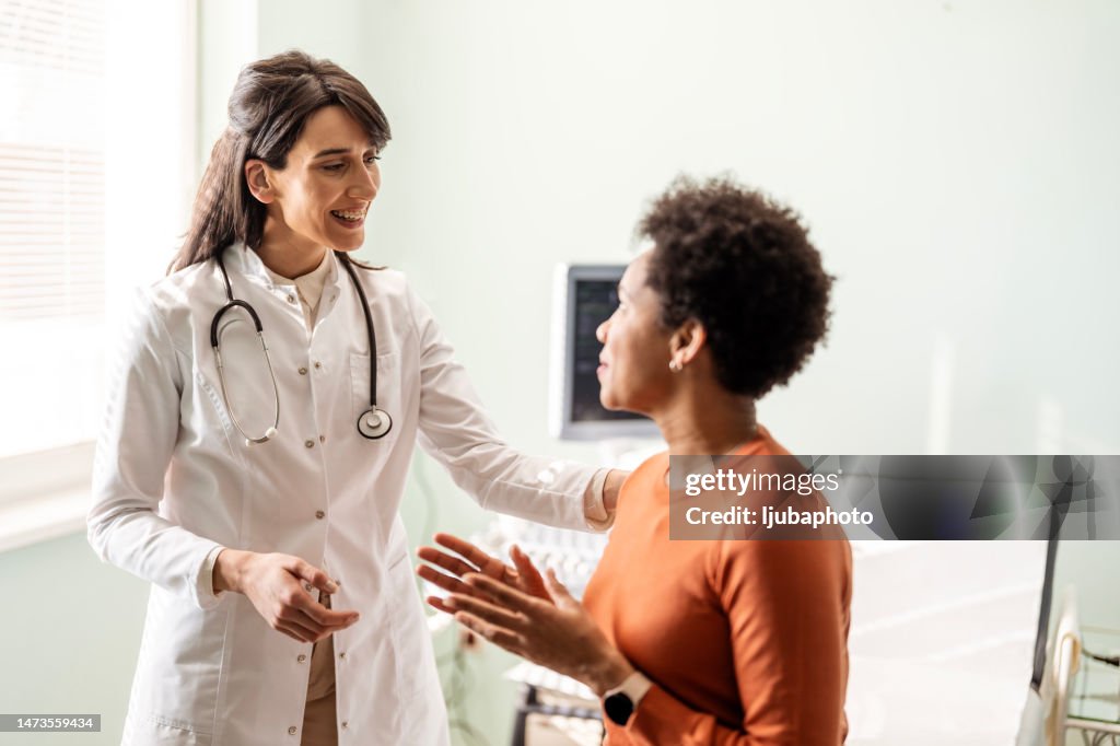 Giving her patient strict instructions for recovery