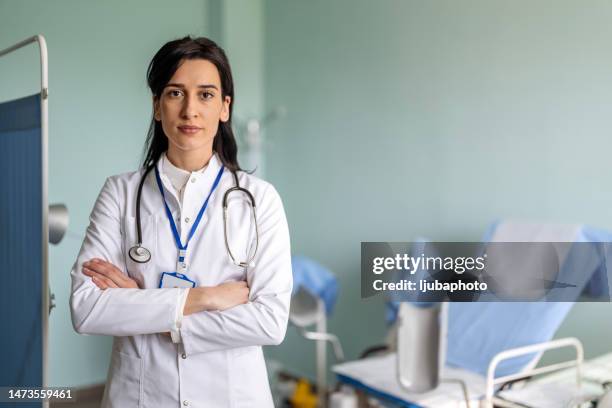 Doctor High Resolution Female Doctor At The Hospital Looking At The Camera And Smiling High ...