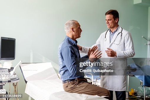 Caring doctor listens to patient Caring doctor listens to patient
