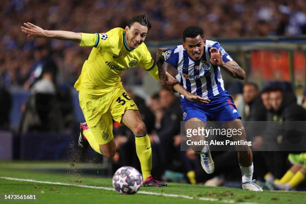 Matteo Darmian of FC Internazionale battles for possession with Galeno of FC Porto during the UEFA Champions League round of 16 leg two match between...