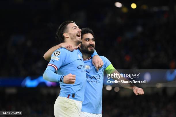 Ilkay Guendogan of Manchester City celebrates with Jack Grealish after scoring the team's fourth goal during the UEFA Champions League round of 16...