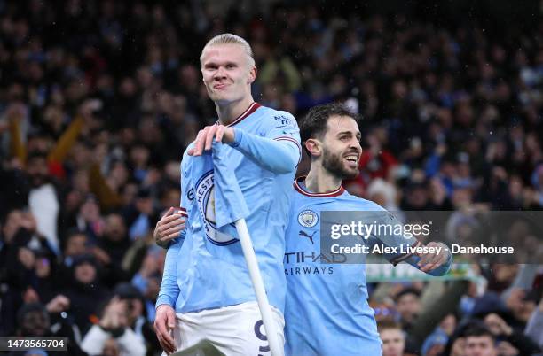 Erling Haaland of Manchester City celebrates with Bernardo Silva after scoring their second goal during the UEFA Champions League round of 16 leg two...