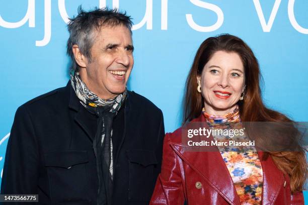 Julien Clerc and Helene Gremillon attend the "Je Verrai Toujours Vos Visages" premiere at Cinema UGC Normandie on March 14, 2023 in Paris, France.