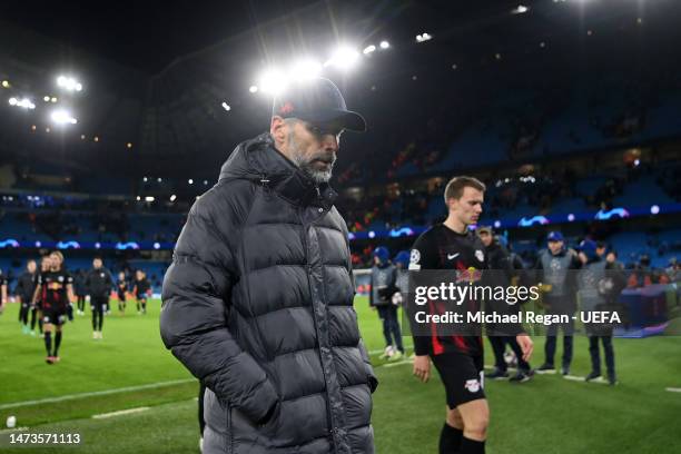 Marco Rose, Head Coach of RB Leipzig, looks dejected as they leave the pitch after their side's defeat in the UEFA Champions League round of 16 leg...