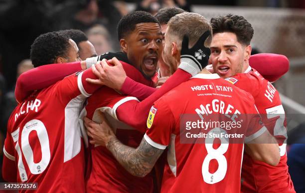 Middlesbrough striker Chuba Akpom celebrates with team mates after scoring the opening goal during the Sky Bet Championship between Middlesbrough and...