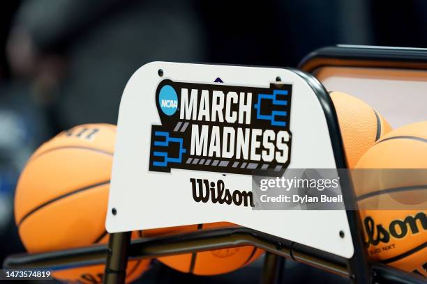 Detailed view of the March Madness logo is seen prior to the First Four of the NCAA Men's Basketball Tournament at University of Dayton Arena on...