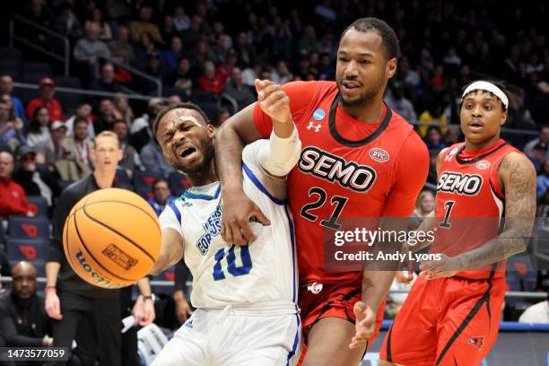 Isaac Mushila of the Texas A&M-CC Islanders collides with Josh Earley of the Southeast Missouri State Redhawks during the first half in the First...