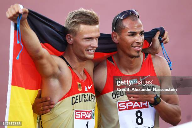 Pascal Behrenbruch of Germany celebrates winning the Men's Decathlon with Norman Muller of Germany during day two of the 21st European Athletics...