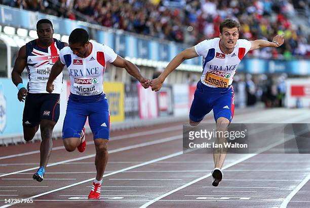 Christophe Lemaitre of France crosses the line ahead of Jimmy Vicaut of France to win the Men's 100 Metres Final during day two of the 21st European...