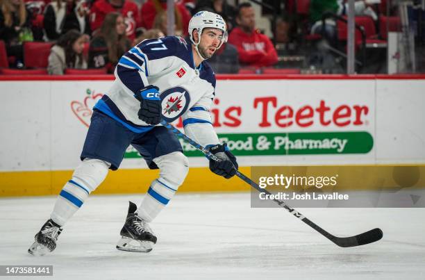 Kyle Capobianco of the Winnipeg Jets skates during the first period against the Carolina Hurricanes at PNC Arena on March 14, 2023 in Raleigh, North...