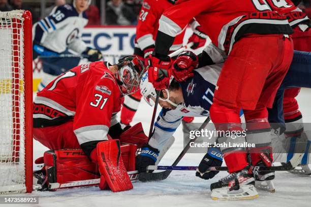 Frederik Andersen of the Carolina Hurricanes makes a save during the second period against the Winnipeg Jets at PNC Arena on March 14, 2023 in...