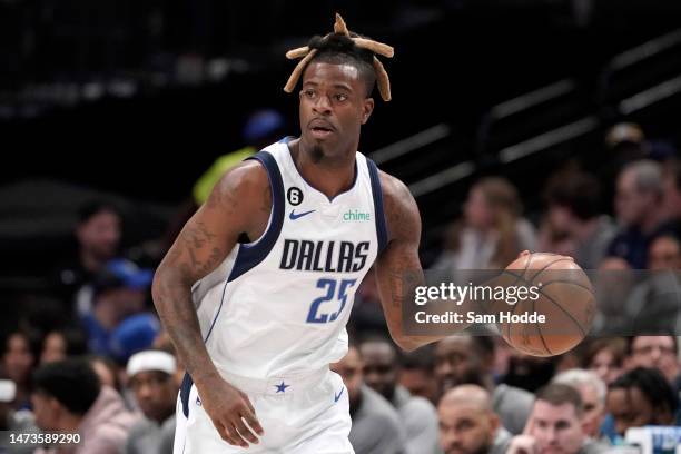 Reggie Bullock of the Dallas Mavericks controls the ball during the first half of the game against the Memphis Grizzlies at American Airlines Center...