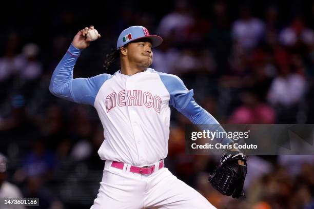 Starting pitcher Taijuan Walker of Team Mexico pitches against Team Great Britain during the first inning of the World Baseball Classic Pool C game...