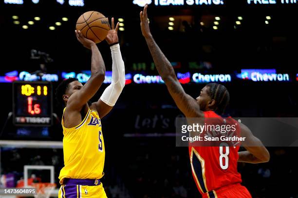 Malik Beasley of the Los Angeles Lakers shoots over Naji Marshall of the New Orleans Pelicans during the fourth quarter of an NBA game at Smoothie...