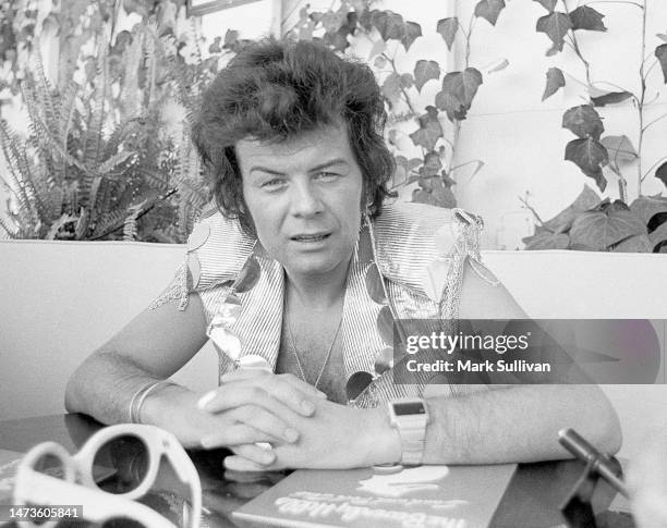 Singer Gary Glitter, real name Paul Gadd during poolside interview at Beverly Hills Hotel, Beverly Hills, CA in 1974.