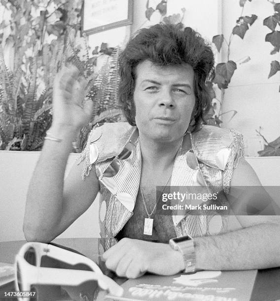 Singer Gary Glitter, real name Paul Gadd during poolside interview at Beverly Hills Hotel, Beverly Hills, CA in 1974.