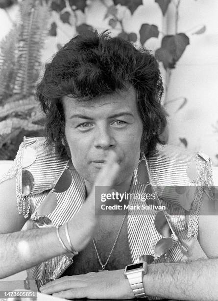 Singer Gary Glitter, real name Paul Gadd during poolside interview at Beverly Hills Hotel, Beverly Hills, CA in 1974.