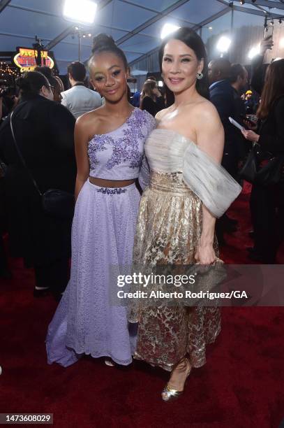 Faithe Herman and Lucy Liu attend the premiere of Warner Bros.' "Shazam! Fury Of The Gods" at Regency Village Theatre on March 14, 2023 in Los...