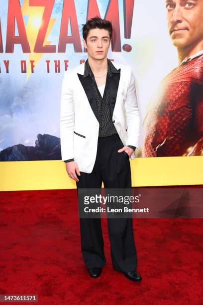 Asher Angel attends the premiere of Warner Bros.' "Shazam 2" at Regency Village Theatre on March 14, 2023 in Los Angeles, California.