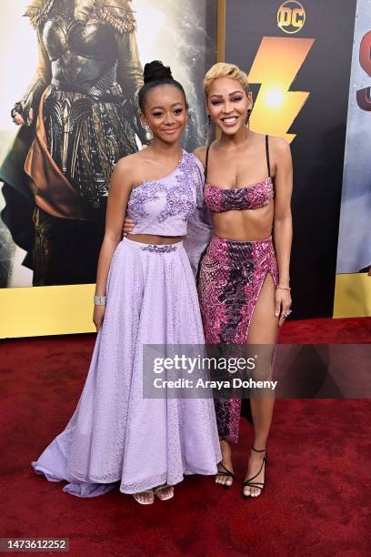 Faithe Herman and Meagan Good attend the Los Angeles premiere of Warner Bros.' "Shazam! Fury Of The Gods" at Regency Village Theatre on March 14,...