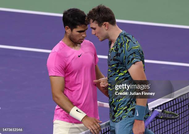 Carlos Alcaraz of Spain consoles Jack Draper of Great Britain after he retired injured during BNP Paribas Open on March 14, 2023 in Indian Wells,...